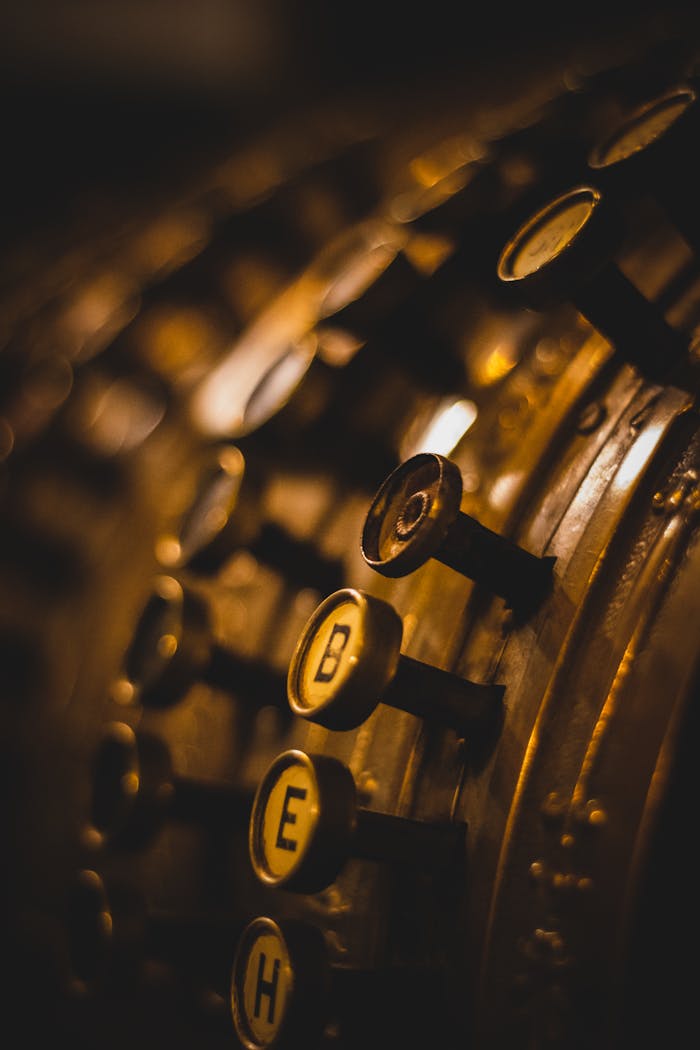 creative Close-up of vintage cash register keys, exuding nostalgia and old-fashioned charm.